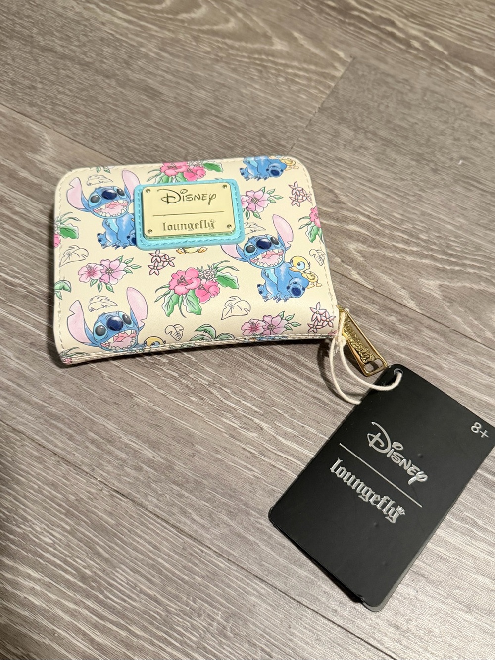 Disney Loungefly wallet allover print of Stitch and flowers
